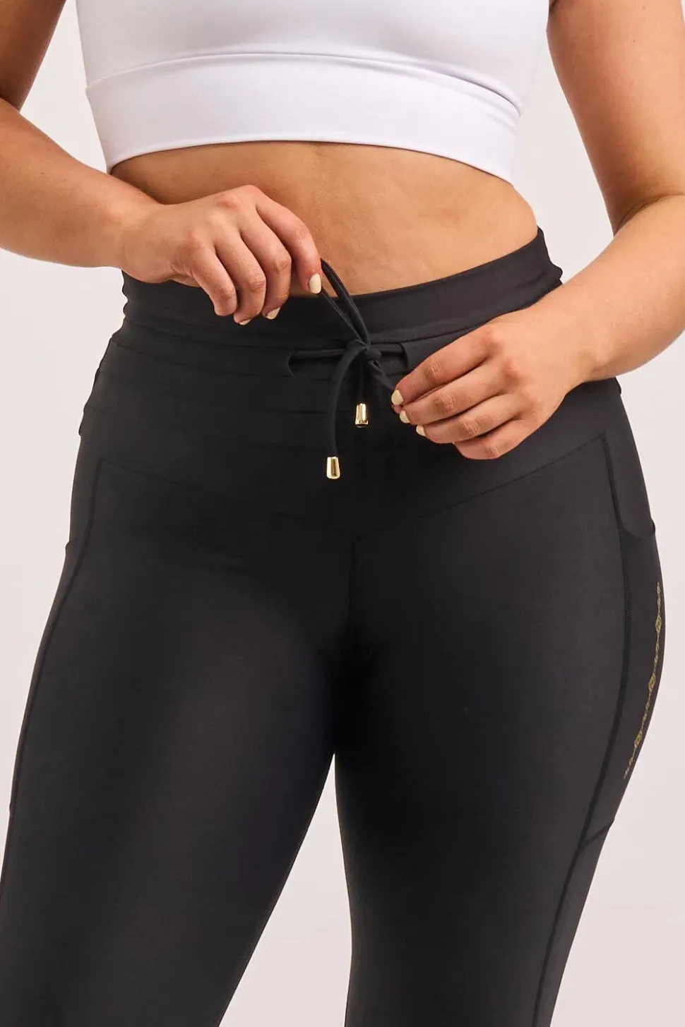 Black Performance - Luxe Panel Pocket Drawstring Capri Leggings